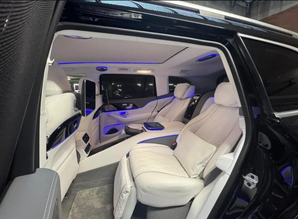 Mercedes-Maybach GLS reclining rear seats with leg rest, cushions and blue ambient lighting