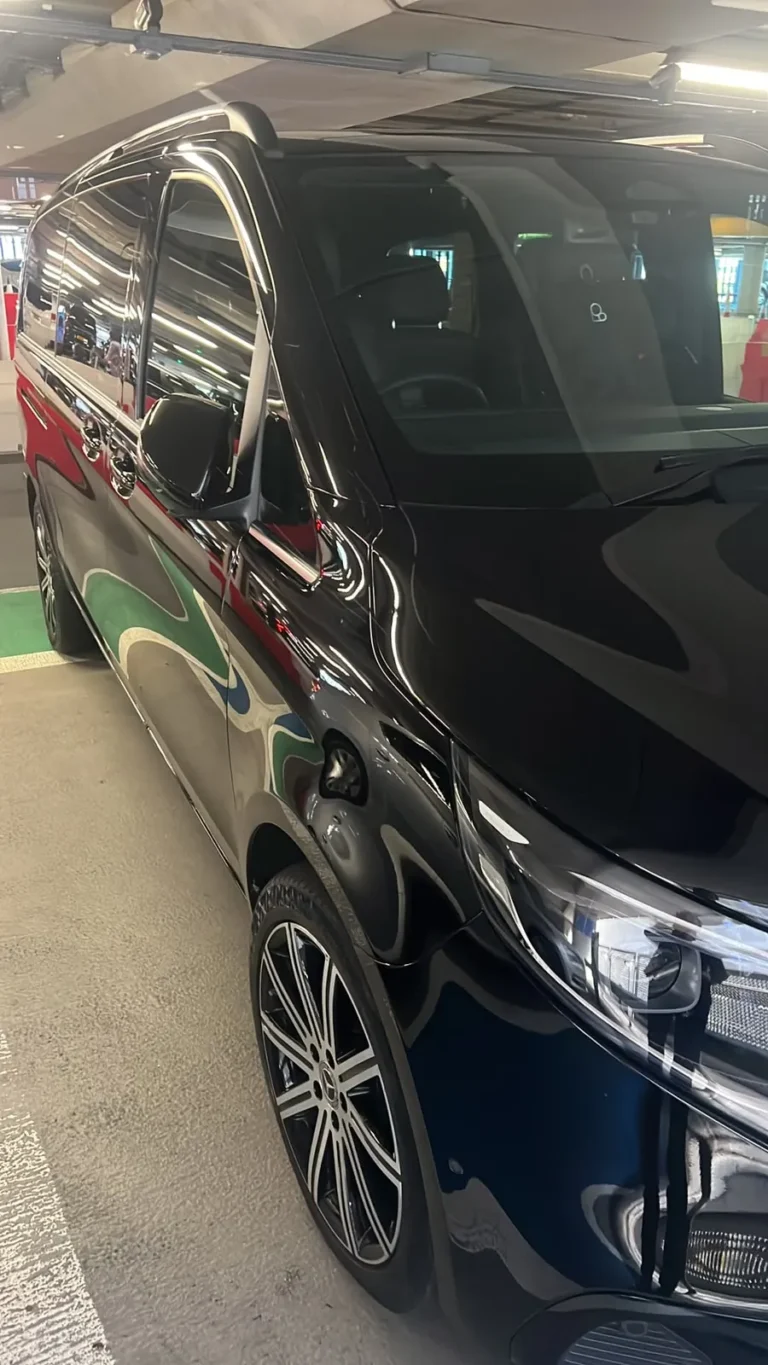 Mercedes V-Class chauffeur MPV ready for passenger pickup at Heathrow Airport