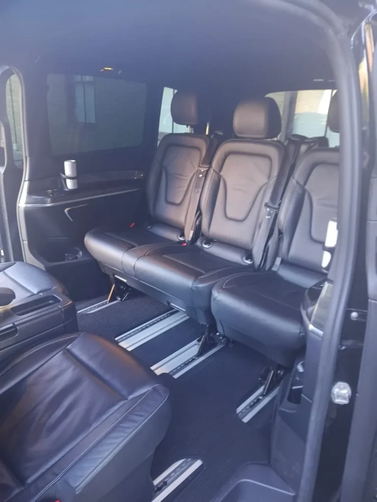 Mercedes V-Class interior with black leather captain seats and rear bench for up to 7 passengers
