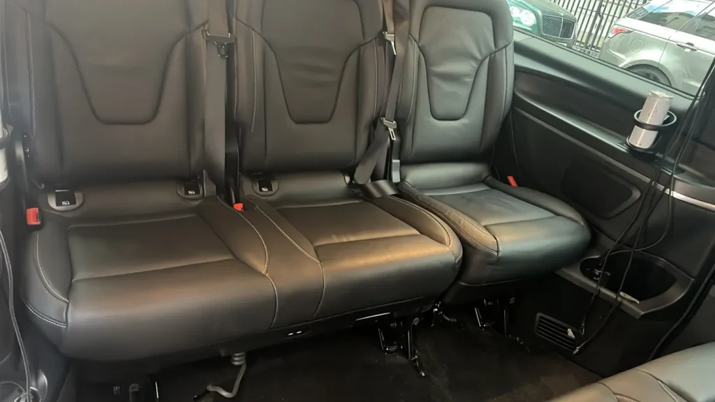 Mercedes V-Class rear bench with three black leather seats and seatbelts