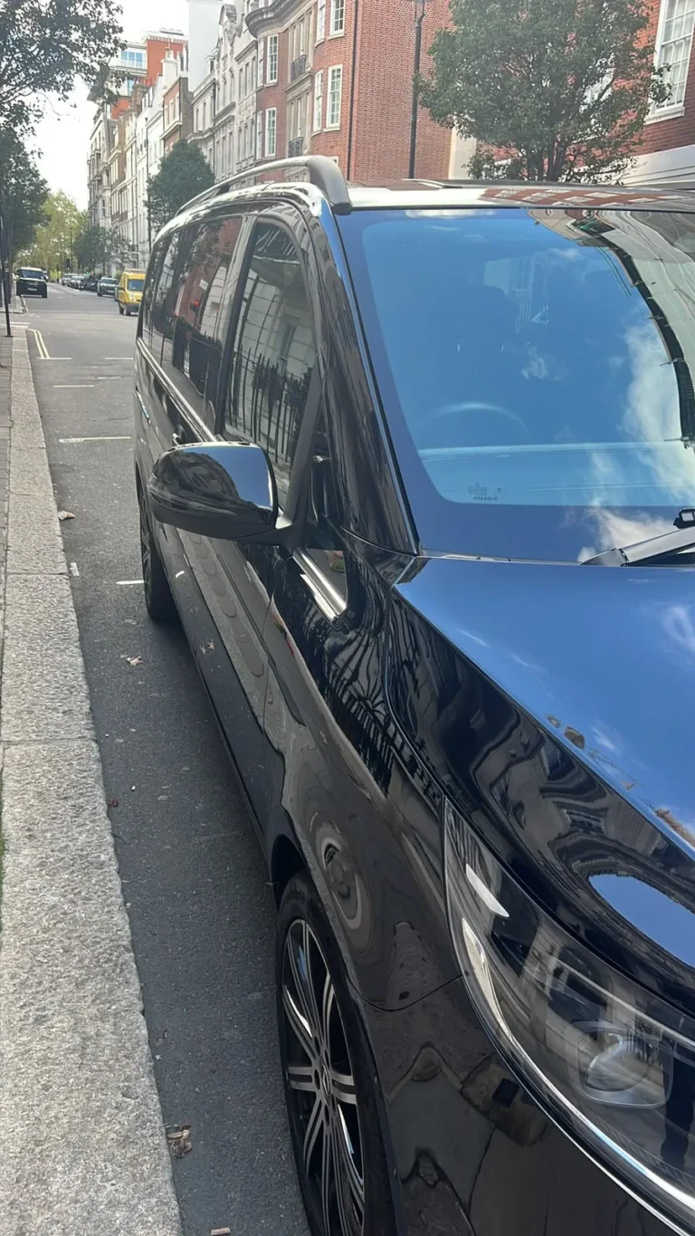 Black Mercedes V-Class MPV side profile parked on a London street